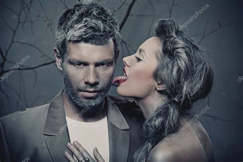 man licking a women